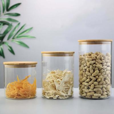 China Freshness Preservation Wholesale Customize Different Size Borosilicate Glass Jar Food Storage With Bamboo Lid for sale