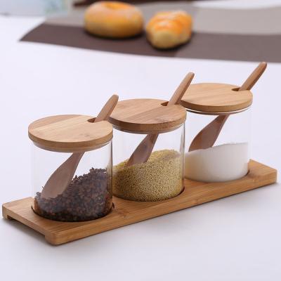 China Sustainable Hot Selling Food Glass Jar Lid Borosilicate Wooden Storage Jars Bamboo Lid for sale