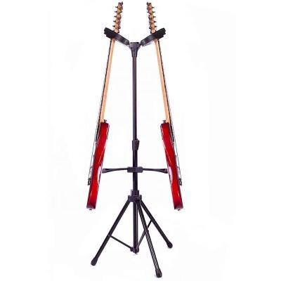 China Stringed Instrument Tripod Gravity Self Locking Guitar Stand Stringed Instrument for sale