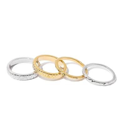 China TRENDY 18K PVD Gold Plated Ins Brass Hammered Irregular Popular High Polished Stacking Couple Rings for sale