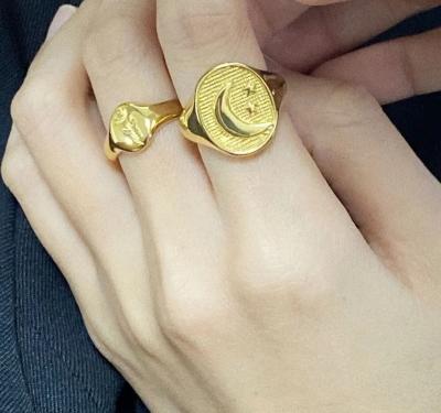 China Waterproof 14K Gold Plated Stainless Steel Star And Moon Embossed High Polished Waterproof Rings For Women for sale