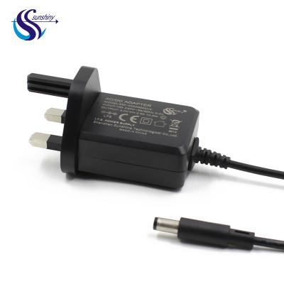 China UK 3 Pins Plug CE ROHS 9v 0.3a 0.5a 0.6a 1a 1.3a AC DC Power Adapter 100ma 200ma 850ma 48*40*24mm for sale