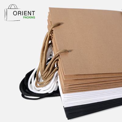 China Custom Recyclable Fast Delivery Kraft Paper Packaging Bag For Shopping And Wedding for sale