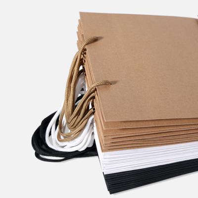 China MOQ Recyclable Small Bulk Kraft Paper White Shopping Paper Bags With Handles for sale