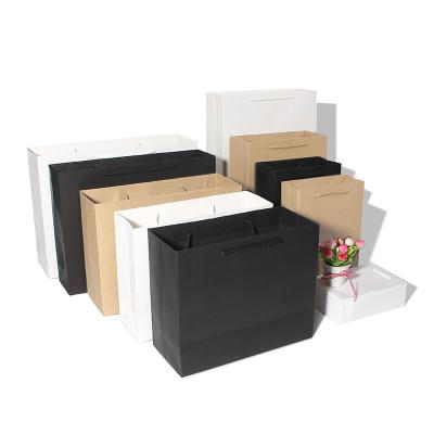 China Recyclable Water Coating Large Brown Gift Paper Gift Bags With Handles Bulk for sale