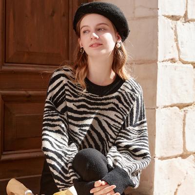 China Anti-wrinkle Fashion Knit Tiger Stripe Lantern Sleeve Sweater Women Intarsia Print Pattern Tiger Sweater for sale