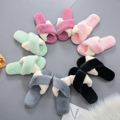 China Women Anti-Slippery Home Slides Warm Cross Soft Plush Faux Rabbit Fur Hairy Slippers Women for sale