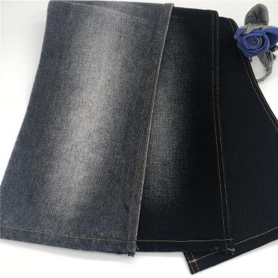 China 2019 Wind Proof 11.2oz Black Cotton Denim Fabric 100% Integrated Production for sale