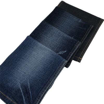 China Blue Stretch 10.7oz Color Cotton Polyester Spandex Jeans Fabric Jeans Fabric for sale