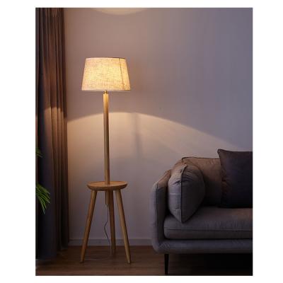 China Residential vertical button floor lamp coffee table wood color floor lamp for storing items for sale