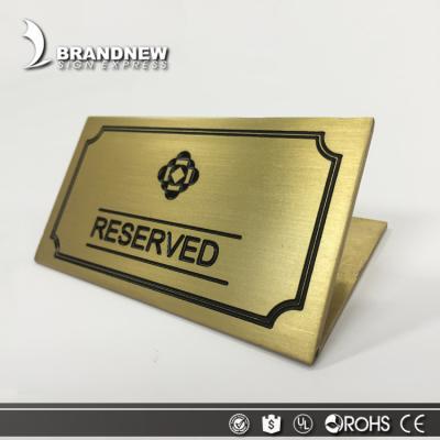 China Easy Installation Maker Outlet Customized Shape Brushed Outdoor Brass Reserved Table Sign for sale