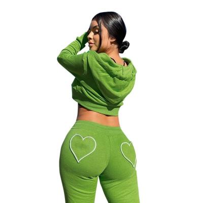 China Breathable Women Autumn Sets 2 Piece Sets Hoodies Solid Color Long Sleeve Drawstring Short Top Pants for sale