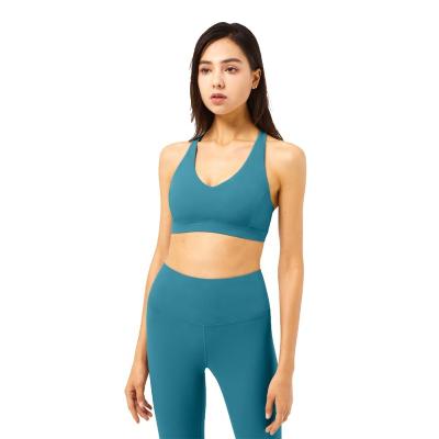 China Breathable casual v-neck bra top and pants yoga wear lift hips equipment used sportswear hot sale yoga bra for sale