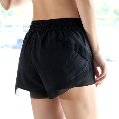 China Polyester Breathable Custom Gym Yoga Wear Women Quick Dry Active Logo Running Yoga Shorts With Lining And Pocket for sale