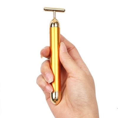 China Rechargeable Slimming Face Beauty Lift Skin Tightening Wrinkle Golden Roller Vibrating Facial Massager for sale