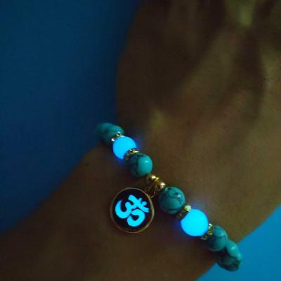 China Glows Jane Eyre Wholesale Fashion Luminous Jewelry Turquoise White Blue Green OM Charm Beaded Bracelet for sale