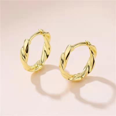 China Other Custom Earrings Twist Circle Cross Earrings Premium Women's Metal Texture Soft Personalized Fashion Gold Plated Earrings for sale