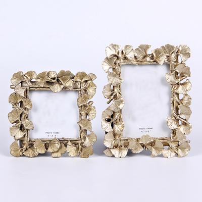 China European retro wedding gold photography frame resin photo frame resin Gingko resin photo view table for sale