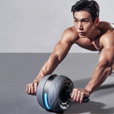 China Home Use Home Fitness Muscles Home Device Men's Fitness Training Ab Wheel Power Automatic Abdominal Roller for sale