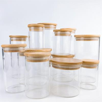 China Household Products Kitchen Food Glass Storage Jar Bottles Jars Container Set With Lid Metal Bamboo Handle for sale