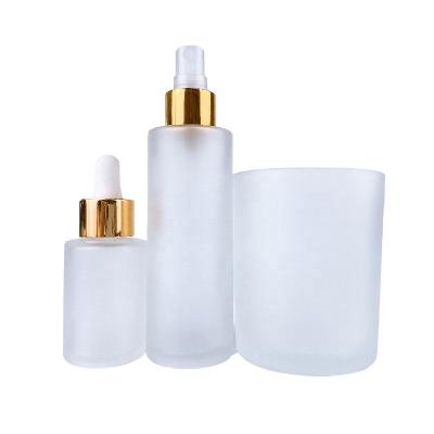 China Clear Frosted Glass Black Flat Shoulder Frosted Dropper Bottle Cosmetic Flat Shoulder Dropper Bottle Essential Oil Glass Bottle for sale