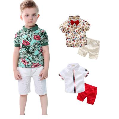 China Boy's summer breathable cotton and pants canvas printed five-point children's short-sleeved shirt holiday set children's boutique clothing sets for sale