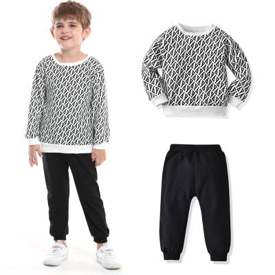 China Casual two-piece suit breathable children's suit spring pullover and autumn printing neck long-sleeved round fashionable fan sweater pants for sale