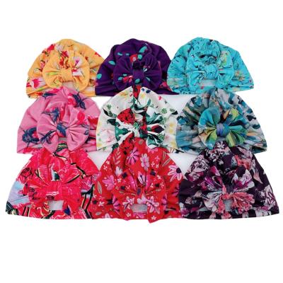 China Autumn European and American thin infant hats spring style cute baby tie by knot printing newborn fontanel hoods hat with bow for sale