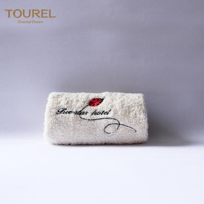 China Sistema 100% de la toalla del hotel de lujo del algodón con el logotipo personalizado del telar jacquar del bordado en venta