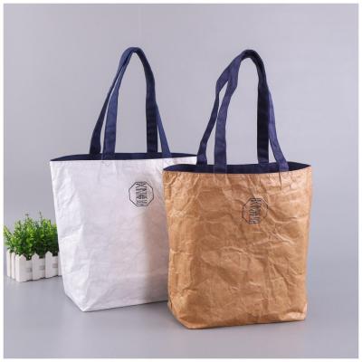 China Recycled materials wholsale kraft paper bag food bag eco-friendly washable shopping bag customize color for sale