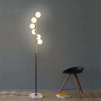 China Decorativel Lighting Simple Creative Fancy Light Standing Post Bedroom Lamp Designer Modern Luxury Living Room Floor Lamp For Home Decor for sale