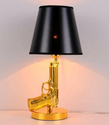 China Energy Efficient Modern Bedroom AK47 Gun Table Lamp Floor Lighting Bedroom Standing Light Table Lamp for sale