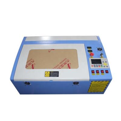 China Laser Engraving Ruida 50w 4060 High Linear Guide Laser Engraving Machine for sale