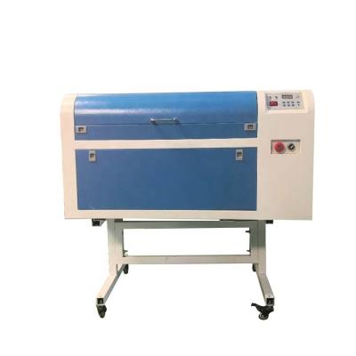 China Laser Engraving 100w 4060 Laser Engraving And Cutting Machine Advertising Crafts Engraving Machine Sheet PVC Rubber Cutting for sale