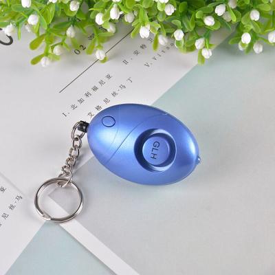 China Loud Noise Mini Self Defense Security Alarms for Women 140DB Personal Attack Security Alarm Key Chain with Flash Light for sale