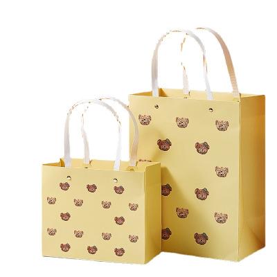 China Recyclable Kids Paper Gift Bag Gift Shopping Candy Bag Custom Gift Tote Handbag Bear Printing OEM Customized LOGO Tote Bags for sale