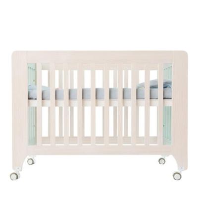 China 2021 Eco-Friendly Crib Kids Wooden Multifunctional Splicing Twin Crib Bed With Wheel for sale