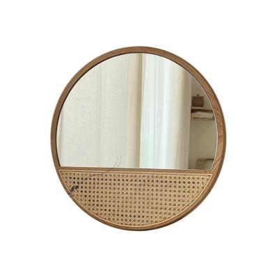 China Handmade Retro Minimalist INS Art Rattan Mirror Round Hanging Mirror Porch Makeup Mirror for sale