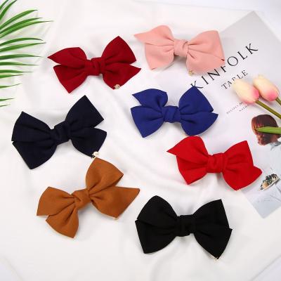 China Fashion Factory Wholesale Colorful Big Bowknot Spring Clip Fashion Hair Clip For Women for sale