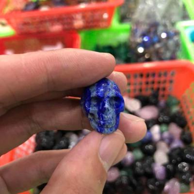 China China wholesale natural crystal crafts small hand carved reiki healing skull stone for pendant necklace for sale