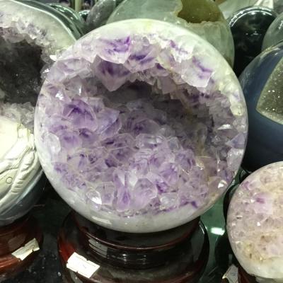 China Smile Natural Open Amethyst Sphere China Geode Crystal Ball Decoration for sale