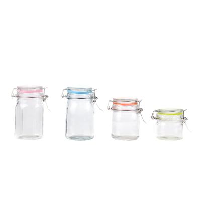 China Hot sale viable 230ml 160ml 100ml round small glass storage jar spice jar candy jar with glass clip lid for sale