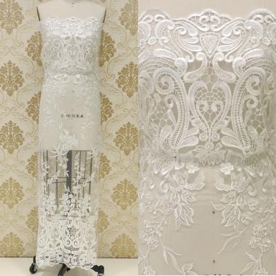 China Elastic ready to ship, CURRENT! ! ! Wholesale Embroidery Beaded Bridal Lace Fabric For Wedding Dress Heavy Handwork Mesh Textiles for sale