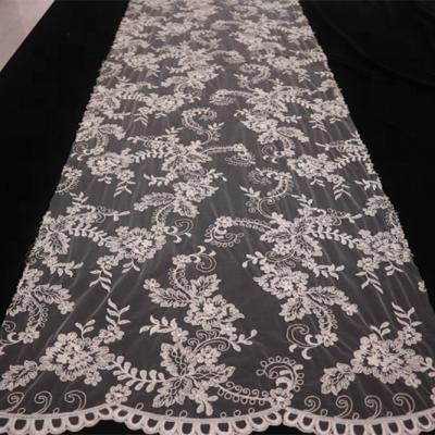 China Viable type of lace fabric and classic handmade beading lace bridal dantel with cords for sale