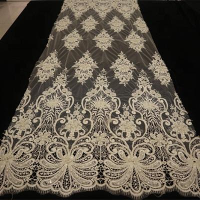 China Sustainable good quality luxury handwork beaded embroidery lace dantel with strings and sequins for sale