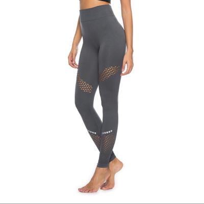 China Antibacterial hot women's mesh stitching slim high waisted butt lift yoga leggings factory wholesale yoga pants for sale