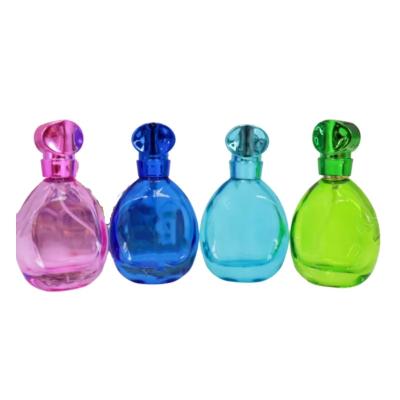 Cina perfume bottle cheap recycled glass bottles black blue red pink green cap plastic and metal roll frog in vendita