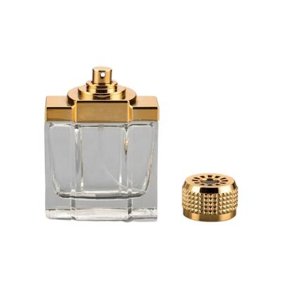 China UV Plastic Cap Empty Perfume Spray Bottles 100ml Glass Golden Cap Color for sale