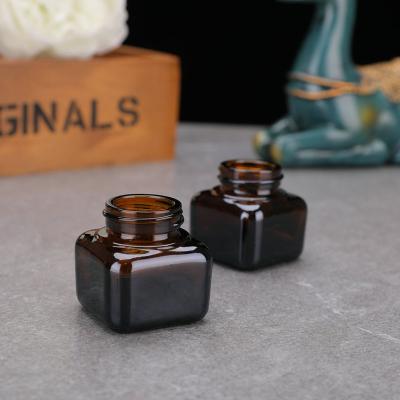 China Empty Face Cream 20ml 30ml 50ml Small Square Glass Jars for sale