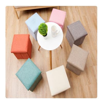 China Foldable Multifunctional Creative Fabric Cotton And Square Folding Home Storage Canvas Stool Storage Stool HMB01 for sale